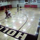 Travis Mims and Katherine Martin (foreground) while playing a pickup-basketball game, caught on surveillance footage inside a Florida high school gym Feb. 17, 2015
YouTube screenshot
